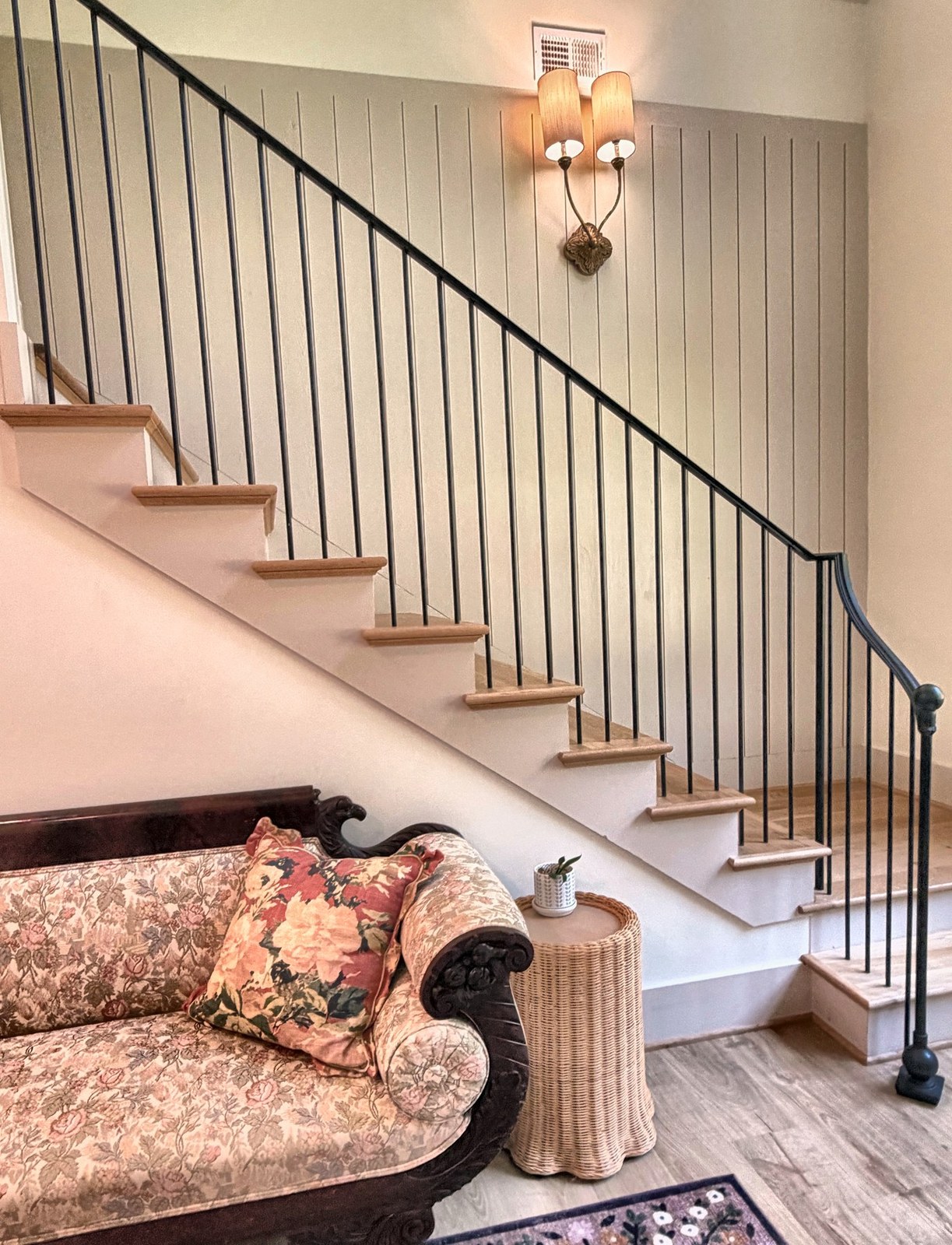 Sitting area in the piano living room with stairs