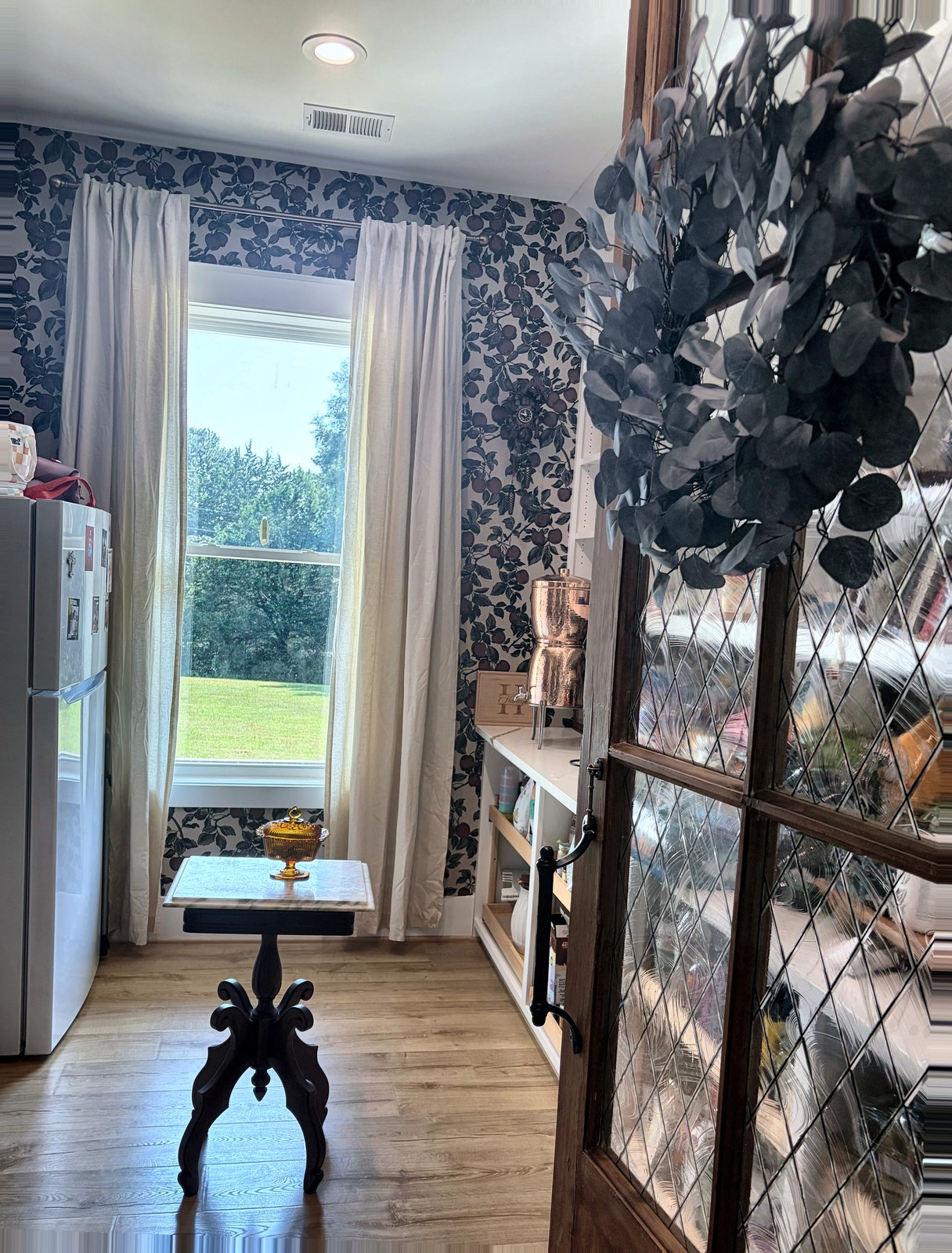 Pantry with wallpaper